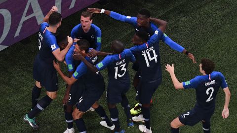 Samuel Umtiti celebrates with teammates after scoring the game's only goal.