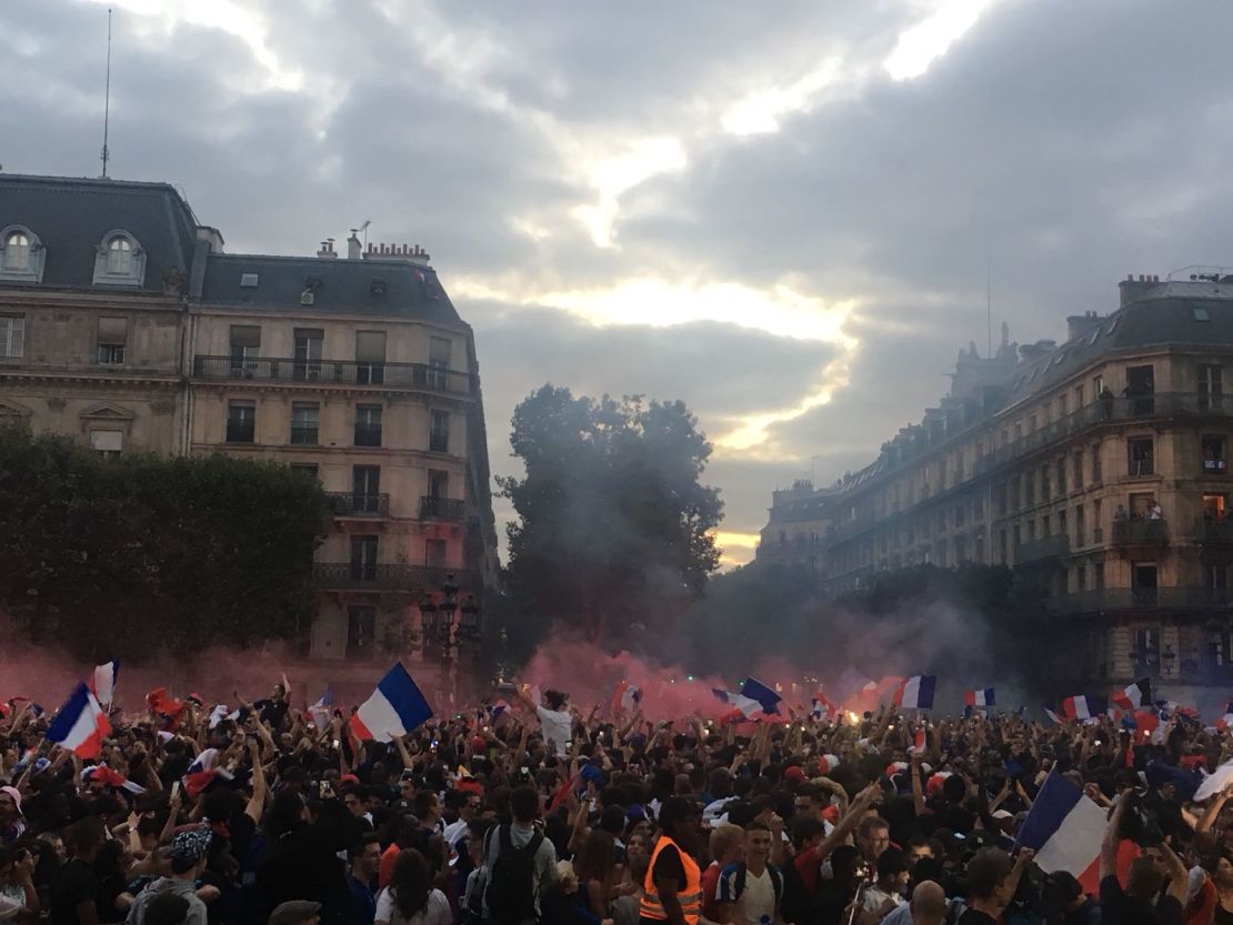 France fans in Paris celebrate the national team reaching the World Cup final