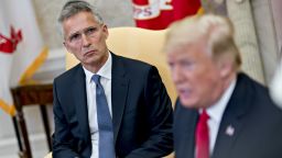 Jens Stoltenberg, secretary general of the North Atlantic Treaty Organization (NATO), listens as U.S. President Donald Trump, right, speaks during a meeting in the Oval Office of the White House May 17, 2018 in Washington, DC. The White House said the two leaders will be discussing the upcoming NATO Summit in July. (Photo by Andrew Harrer-Pool/Getty Images)