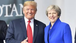 U.S. President Donald Trump gives thumb-up when standing beside British Prime Minister Theresa May during a summit of heads of state and government at NATO headquarters in Brussels on Wednesday, July 11, 2018. NATO leaders gather in Brussels for a two-day summit to discuss Russia, Iraq and their mission in Afghanistan. Geert Vanden Wijngaert/AP