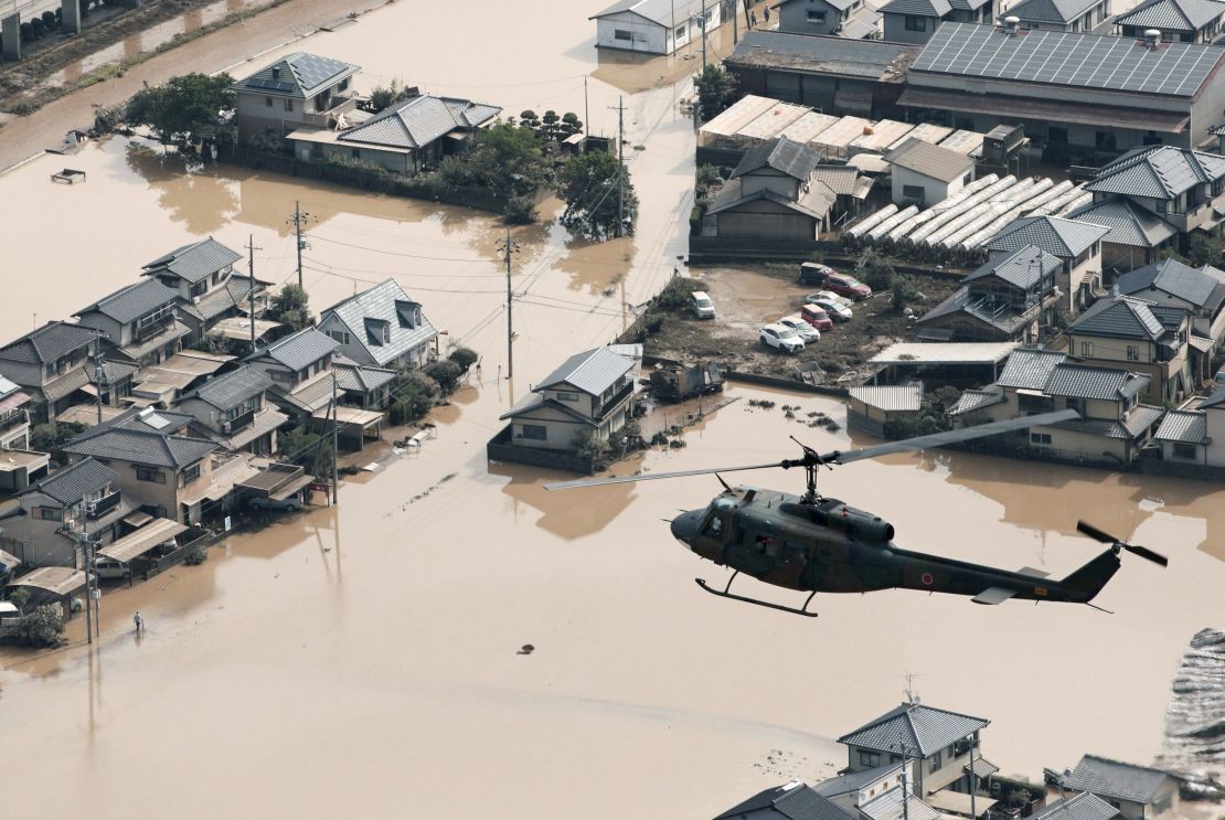 A residential area is seen on July 9 in Kurashiki, Okayama Prefecture, submerged following torrential rains that hit a wide area of western Japan.