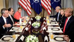 NATO Secretary General Jens Stoltenberg (L), US President Donald Trump (R), NATO Assistant Secretary General for Political Affairs and Security Policy Alejandro Alvargonzalez (2L), NATO Spokesperson Oana Lungescu (3L) and White House Chief of Staff John Kelly (3R) and US Ambassador to NATO Kay Bailey Hutchison (2R) speak at a breakfast meeting at the US chief of mission's residence in Brussels on July 11, 2018, ahead of a NATO (North Atlantic Treaty Organization) summit. Brendan Smialowski/AFP/Getty Images