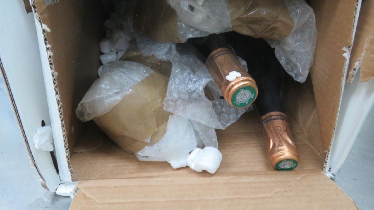Drugs valued at 3.3 million AUD were hidden and distributed in bubble-wrapped wine bottles, potato chip packets and chilli paste tubes 