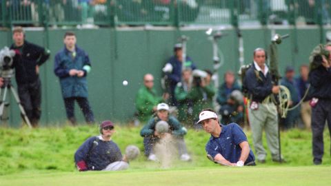 French golfer Jean Van de Velde takes his 6th shot on the 18th green in the final round of the British Open Championship at Carnoustie, Scotland, 18th July 1999. Having arrived at the 18th tee with a three-shot lead, Van de Velde narrowly lost the championship to Paul Lawrie. (Photo by Stephen Munday/Getty Images)