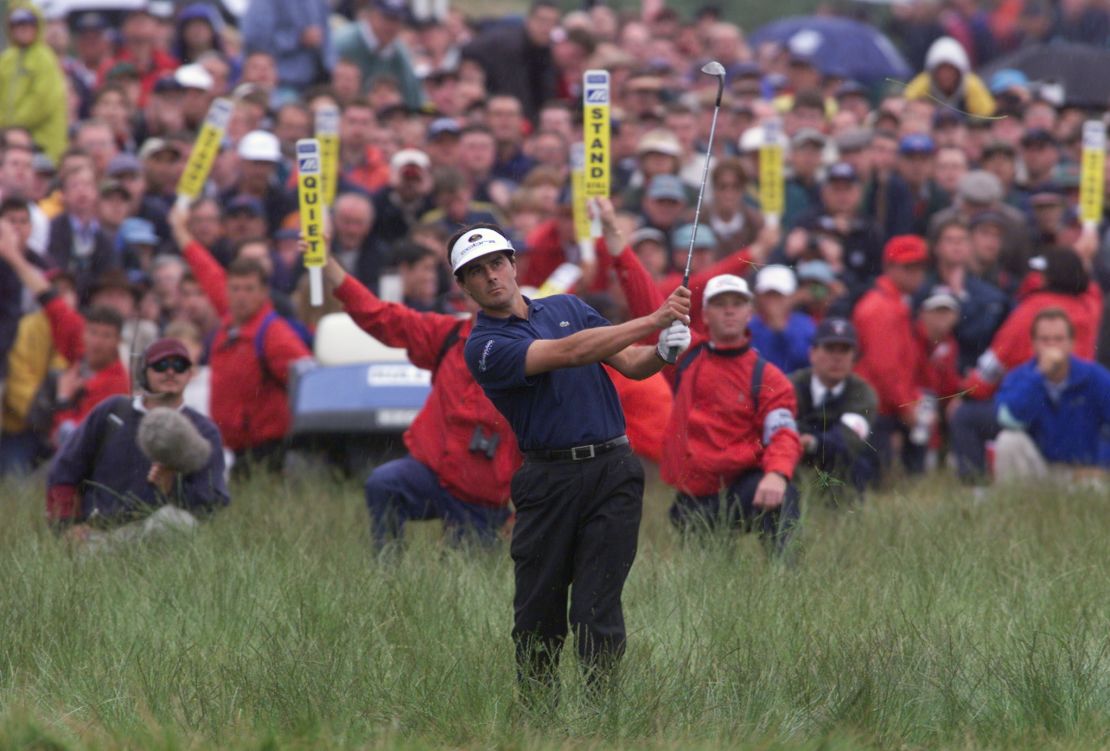 Van de Velde played his third from deep rough after the ball ricocheted off the grandstand.