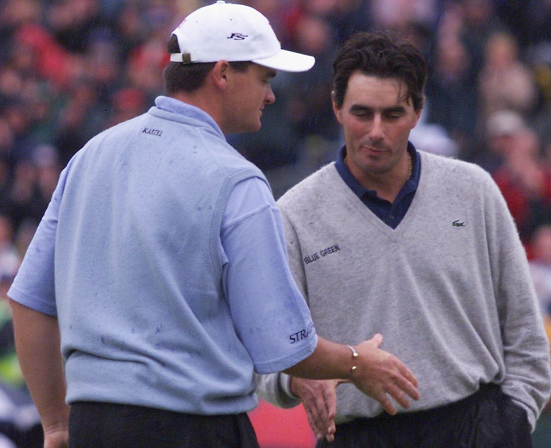 Van de Velde lost out to Paul Lawrie (left), who came from 10 shots back on the final day to win the Open in a playoff.