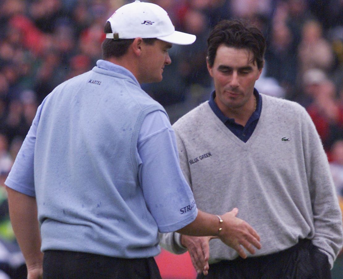 Van de Velde lost out to Paul Lawrie (left), who came from 10 shots back on the final day to win  the Open in a playoff.