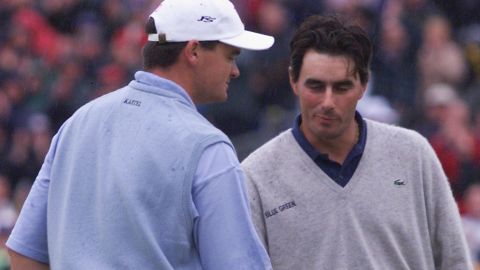 Van de Velde lost out to Paul Lawrie (left), who came from 10 shots back on the final day to win  the Open in a playoff.