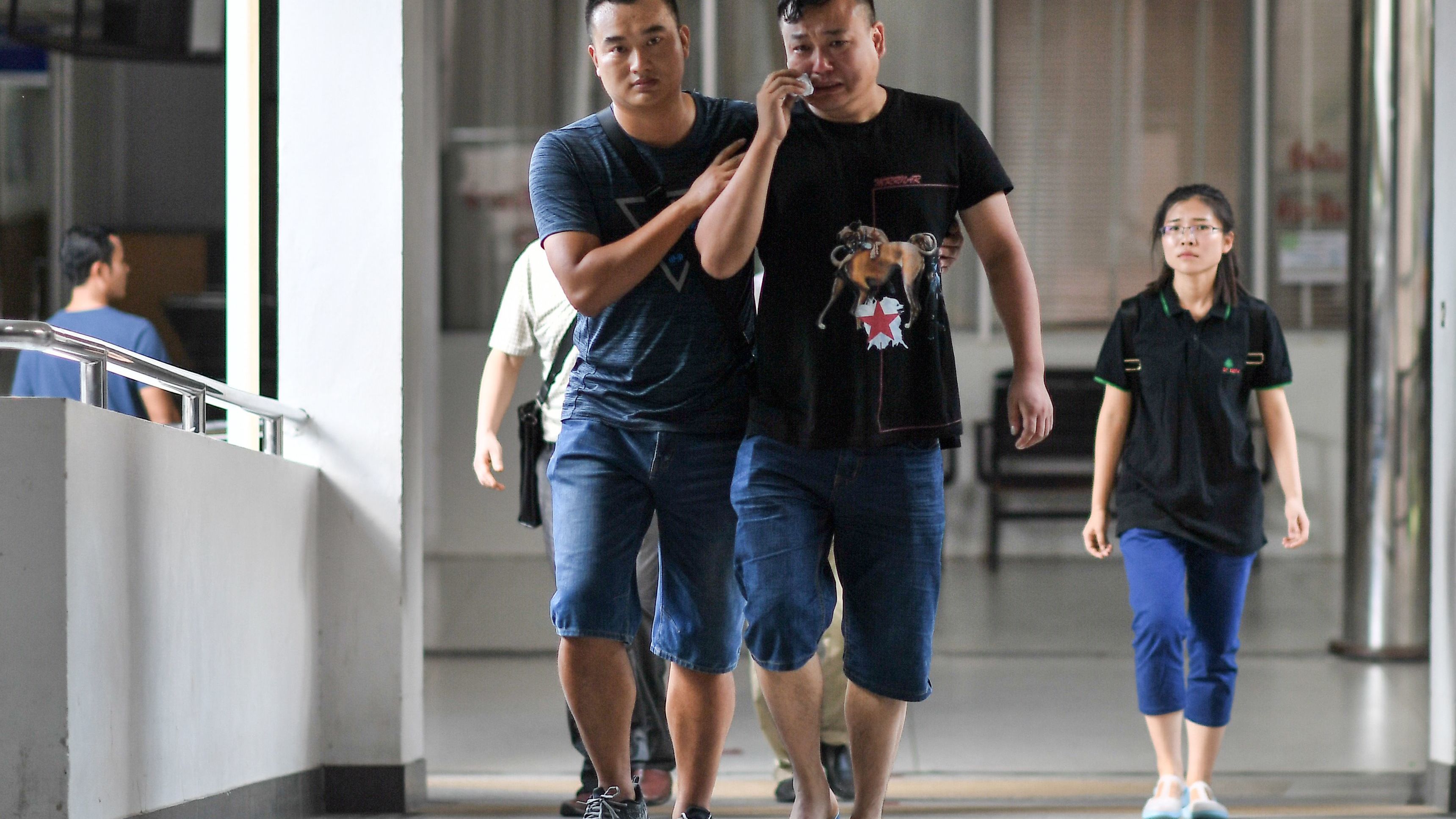 A Chinese relative cries at the Vachira Phuket Hospital in Phuket on Sunday.
