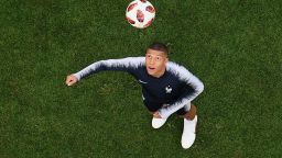 France's forward Kylian Mbappe eyes the ball as he warms up prior to the Russia 2018 World Cup semi-final football match between France and Belgium at the Saint Petersburg Stadium in Saint Petersburg on July 10, 2018. (Photo by Jewel SAMAD / AFP) / RESTRICTED TO EDITORIAL USE - NO MOBILE PUSH ALERTS/DOWNLOADS        (Photo credit should read JEWEL SAMAD/AFP/Getty Images)
