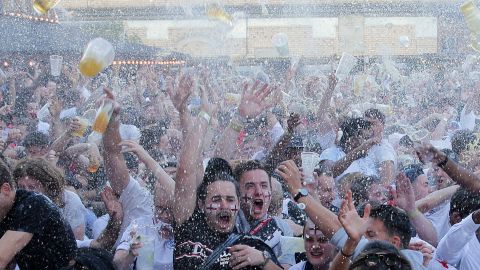 England supporters in Flat Iron Square, London celebrate as Kieran Trippier scores the opener.