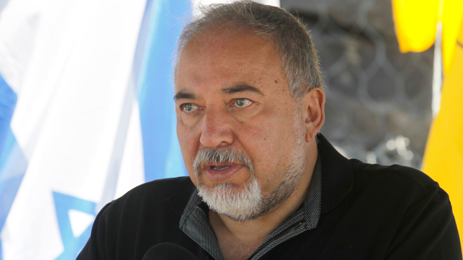 Israeli Defence Minister Avigdor Lieberman speaks to the press during a visit at the Israel-Syria border in the annexed Golan Heights on Tuesday.