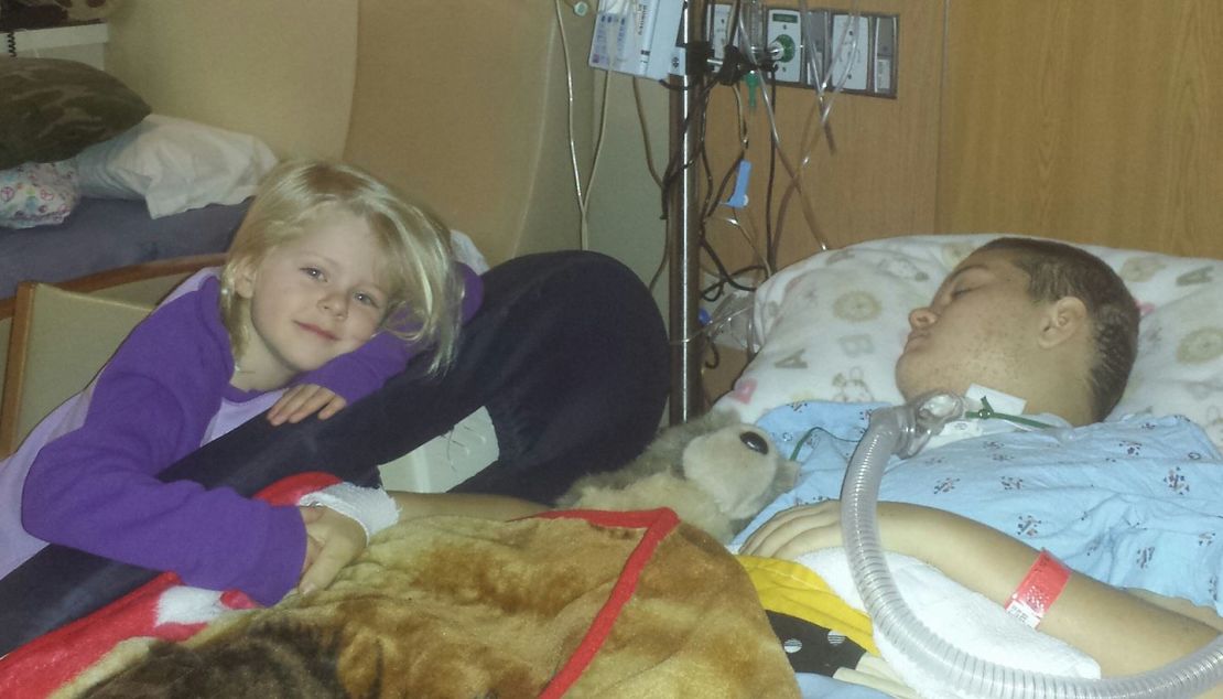 Alyssa Gilderhus with her younger sister resting at the Mayo Clinic.