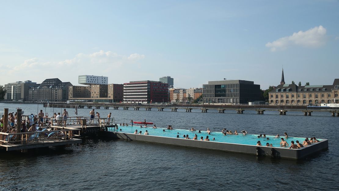 Badeschiff outdoor swimming pool lies in the Spree River.