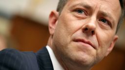 WASHINGTON, DC - JULY 12:  Deputy Assistant FBI Director Peter Strzok (C) waits to testify before a joint committee hearing of the House Judiciary and Oversight and Government Reform committees in the Rayburn House Office Building on Capitol Hill July 12, 2018 in Washington, DC. While involved in the probe into Hillary Clinton's use of a private email server in 2016, Strzok exchanged text messages with FBI attorney Lisa Page that were critical of Trump. After learning about the messages, Mueller removed Strzok from his investigation into whether the Trump campaign colluded with Russia to win the 2016 presidential election.  (Photo by Chip Somodevilla/Getty Images)