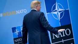 US President Donald Trump waves after being welcomed by the NATO Secretary General for the NATO (North Atlantic Treaty Organization) summit at the NATO headquarters in Brussels on July 11, 2018. (BRENDAN SMIALOWSKI/AFP/Getty Images)