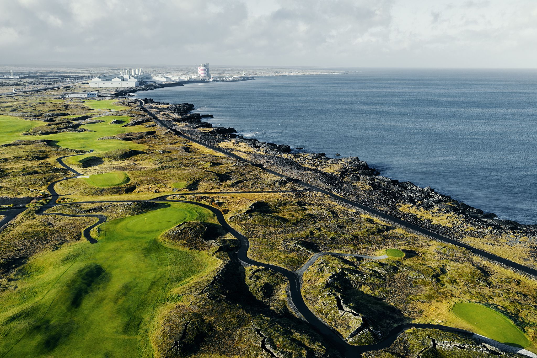 The front nine holes are some of the most challenging with the course located in a lava field. The back nine is located on former farmland on the Hvaleyri peninsula.