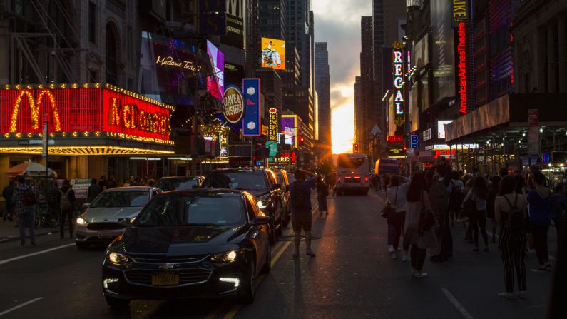 <strong>Times Square:</strong> The lights of <a  target="_top" href="/newspapers?url=https://www.cnn.com/travel/article/times-square-guide-locals/index.html">Times Square</a> get some sunny competition.