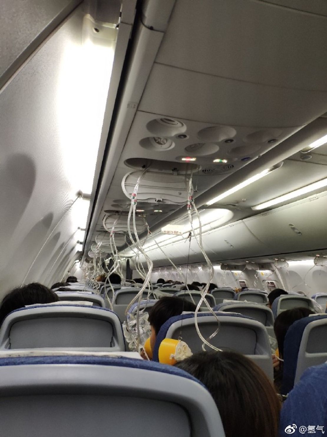 Passengers were required to wear oxygen masks after a loss of cabin pressure caused the plane to drop in the sky.