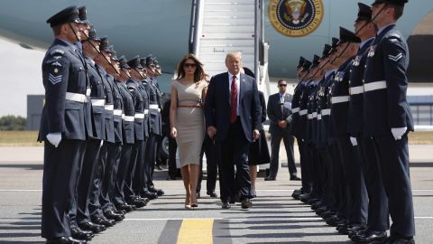 Donald Trump and first lady Melania Trump step off Air Force One as they arrive at London's Stansted airport.