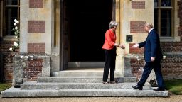 Britain's Prime Minister Theresa May (L) welcomes US President Donald Trump and on his arrival for a meeting at Chequers, the prime minister's country residence, near Ellesborough, northwest of London on July 13, 2018 on the second day of Trump's UK visit. - US President Donald Trump launched an extraordinary attack on Prime Minister Theresa May's Brexit strategy, plunging the transatlantic "special relationship" to a new low as they prepared to meet Friday on the second day of his tumultuous trip to Britain. (Photo by Brendan Smialowski / AFP)        (Photo credit should read BRENDAN SMIALOWSKI/AFP/Getty Images)