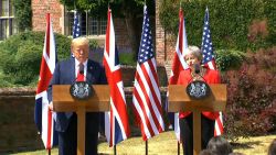 Trump/London/UK/Pool Path 2 THERESA MAY PM UK HOLDING HANDS ON WAY TO PRESSER
