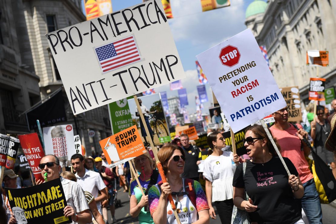 Protesters join a women's march in central London on Friday to demonstrate against Trump's visit to the UK.