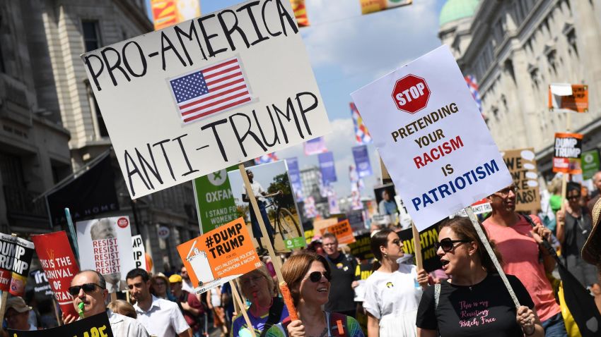 LONDON, ENGLAND - JULY 13:  Protesters join a Women's march in central London to demonstrate against President Trump's visit to the UK, on July 13, 2018 in London, England. Tens of Thousands Of Anti-Trump protesters are expected to demonstrate in London and across the country against the UK visit by the President of the United States. Many people disagree with his policies that include migrant family separation, discrimination of transgender military personnel and changes to laws protecting women's sexual health.  (Photo by Chris J Ratcliffe/Getty Images)