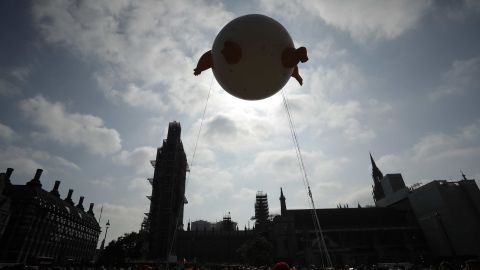 The "Trump Baby" is seen against the backdrop of the scaffolded Houses of Parliament and Big Ben in London.