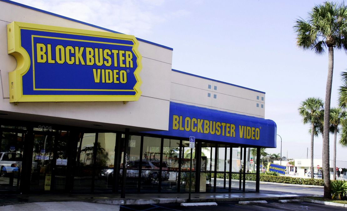 MIAMI, UNITED STATES:  A Blockbuster video rental store is shown 11 March 2005 in Miami, Florida. Blockbuster Inc., the world's largest video rental chain, reported a slim profit for the fourth quarter, in contrast to a loss a year ago, and said it would restate certain financials to correct lease accounting errors. The company will also extend it's nearly a 1 billion USD offer for rival Hollywood Entertainment until 11 March 2005.  AFP Robert SULLIVAN  (Photo credit should read ROBERT SULLIVAN/AFP/Getty Images)