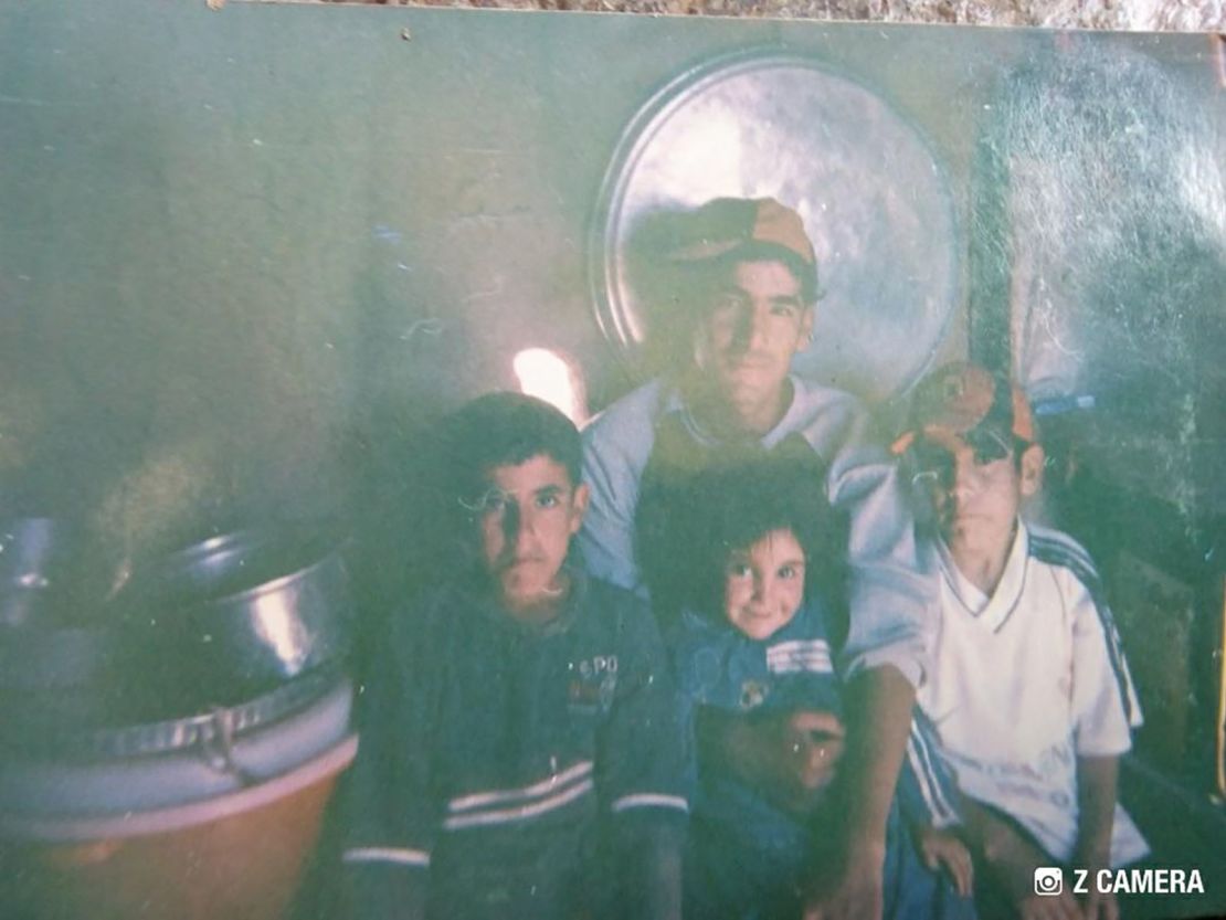 Majhor with his younger siblings in Shingal in 2009.