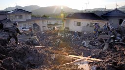 Japan Self-Defense Force members conduct search operations in Kumano, Hiroshima, on July 11.