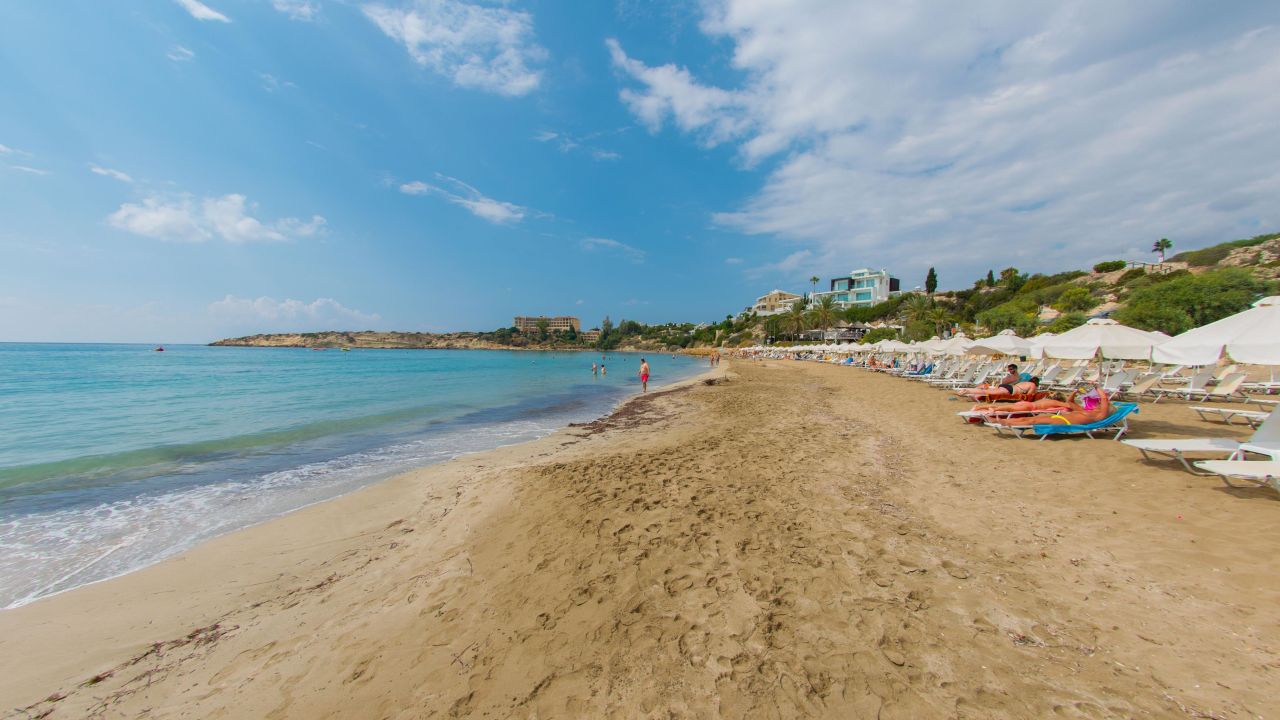 <strong>Coral Bay</strong>: Spotless sand and blue waters characterize Coral Bay, a popular spot for sun-seekers in Cyprus. 