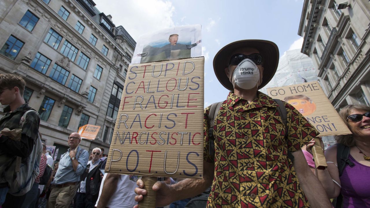 A protest sign playing on words from a 'Mary Poppins' song.