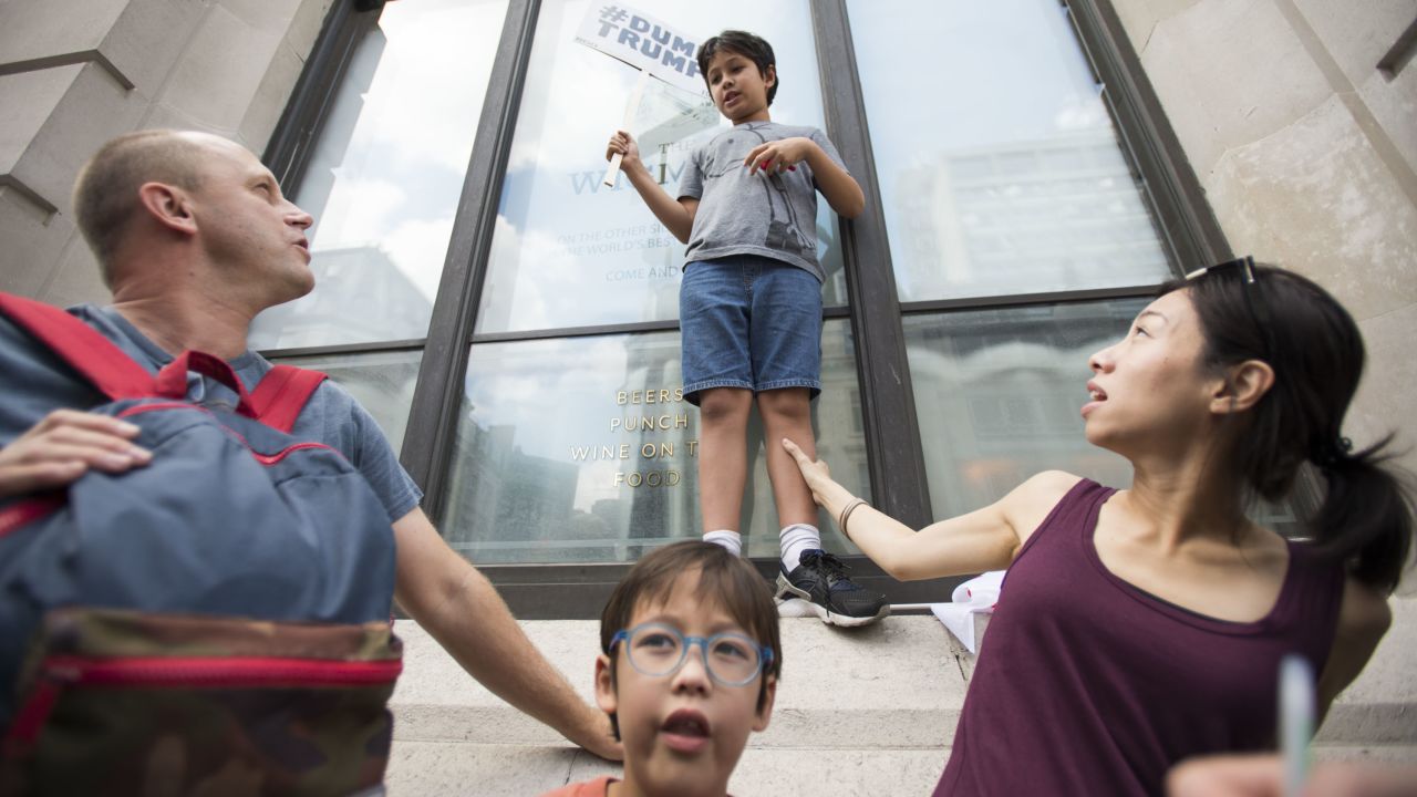 The Hofford family from Hong Kong attends the protest.
