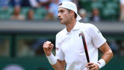 LONDON, ENGLAND - JULY 13: John Isner of The United States celebrates a point against Kevin Anderson of South Africa during their Men's Singles semi-final match on day eleven of the Wimbledon Lawn Tennis Championships at All England Lawn Tennis and Croquet Club on July 13, 2018 in London, England.  (Photo by Matthew Stockman/Getty Images)