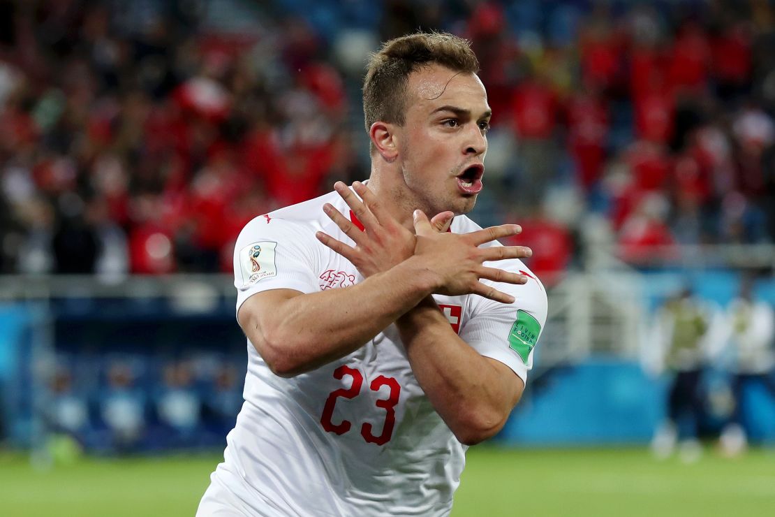 Shaqiri celebrates after scoring Switzerland's winner against Serbia.