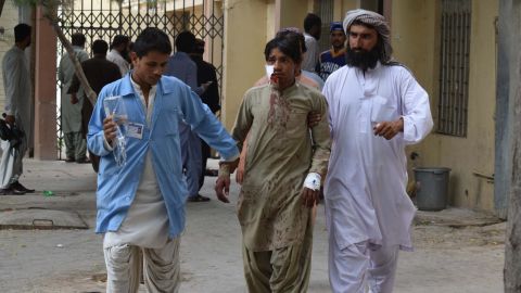 A victim of the bomb blast in Balochistan is brought to a hospital in Quetta on Friday.