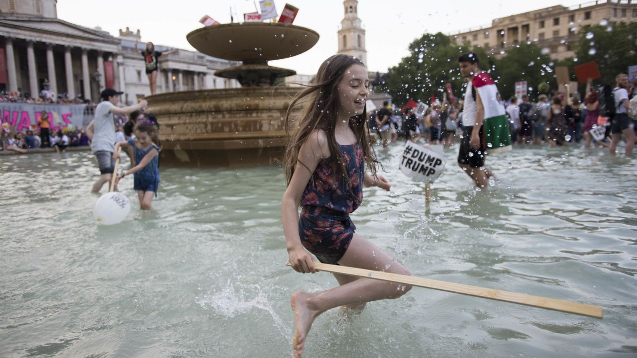 Aurora Haselfoot Flint celebrates her 10th birthday with a protest and splash in the Trafalgar Square fountain.