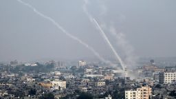 A picture taken on July 14, 2018 shows Palestinian rockets being fired from Gaza City towards Israel. - Israel's military said it had launched air strikes targeting Hamas in the Gaza Strip on July 14 as rockets and mortars were lobbed into southern Israel from the blockaded Palestinian enclave. (Photo by Bashar TALEB / AFP)        (Photo credit should read BASHAR TALEB/AFP/Getty Images)
