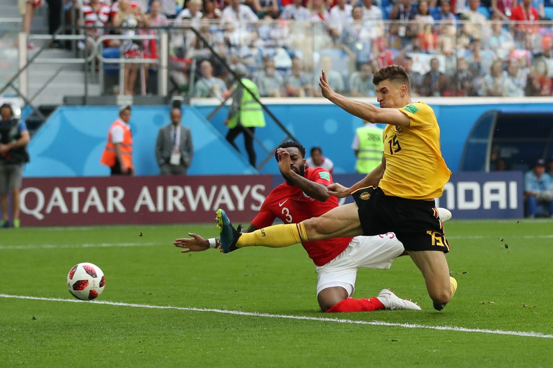 Thomas Meunier appears at the far post to give Belgium the lead.