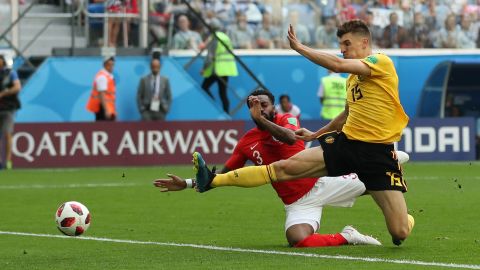 Thomas Meunier appears at the far post to give Belgium the lead.