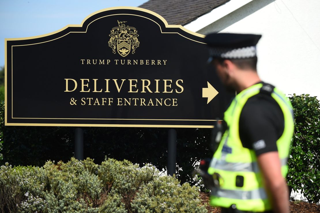 A police officer stands guard outside Trump Turnberry.