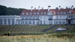 Police offficers stand guard at Trump Turnberry, the luxury golf resort of US President Donald Trump, in Turnberry, southwest of Glasgow, Scotland on July 14, 2018, during the private part of his four-day UK visit. - US President Donald Trump wraps up a four-day visit to Britain, dominated by his blasting of Prime Minister Theresa May's Brexit strategy, by spending the weekend in Scotland. (Photo by ANDY BUCHANAN / AFP)        (Photo credit should read ANDY BUCHANAN/AFP/Getty Images)