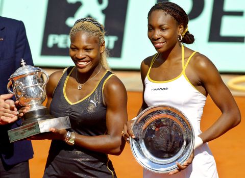Conquering clay. Serena beats sister Venus at Roland Garros 7-5 6-3 in 2002 to claim her second grand slam at the French Open.