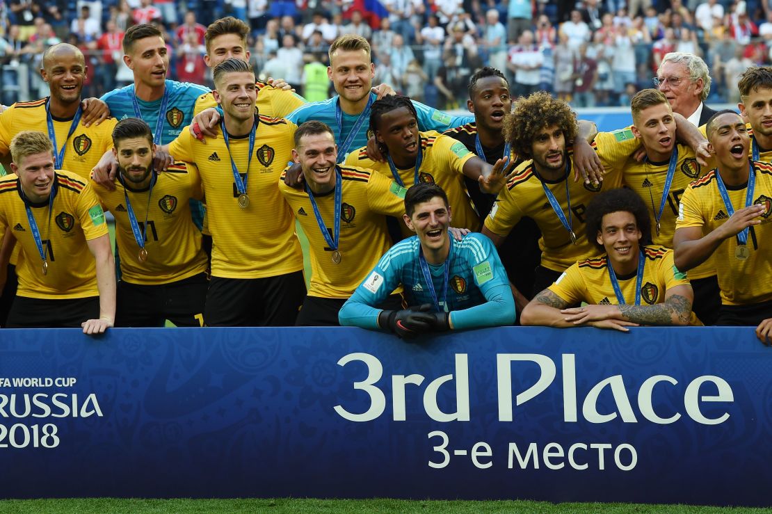 Belgium's players celebrate their play-off victory over England.