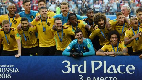 Belgium's players celebrate their play-off victory over England.
