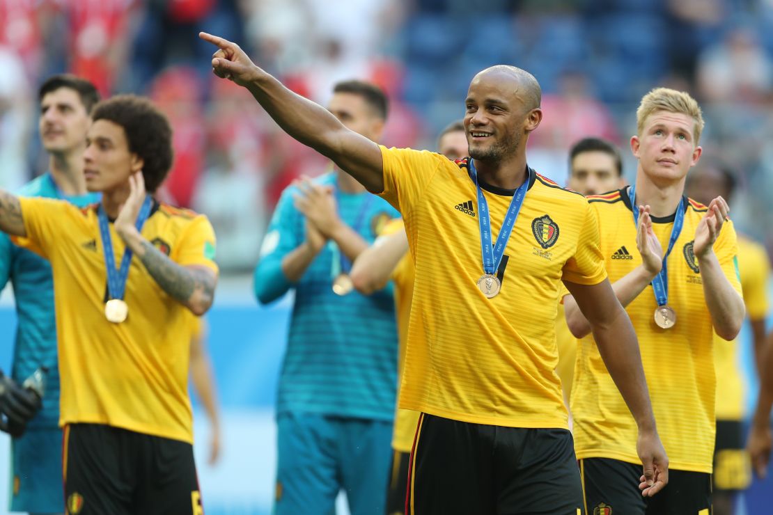 Vincent Kompany celebrates his bronze medal.