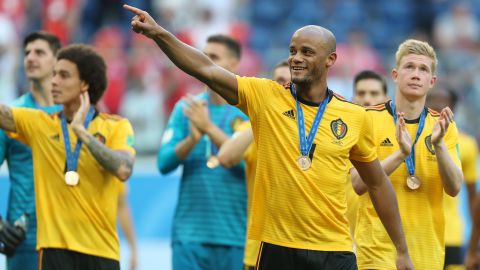 Vincent Kompany celebrates his bronze medal.