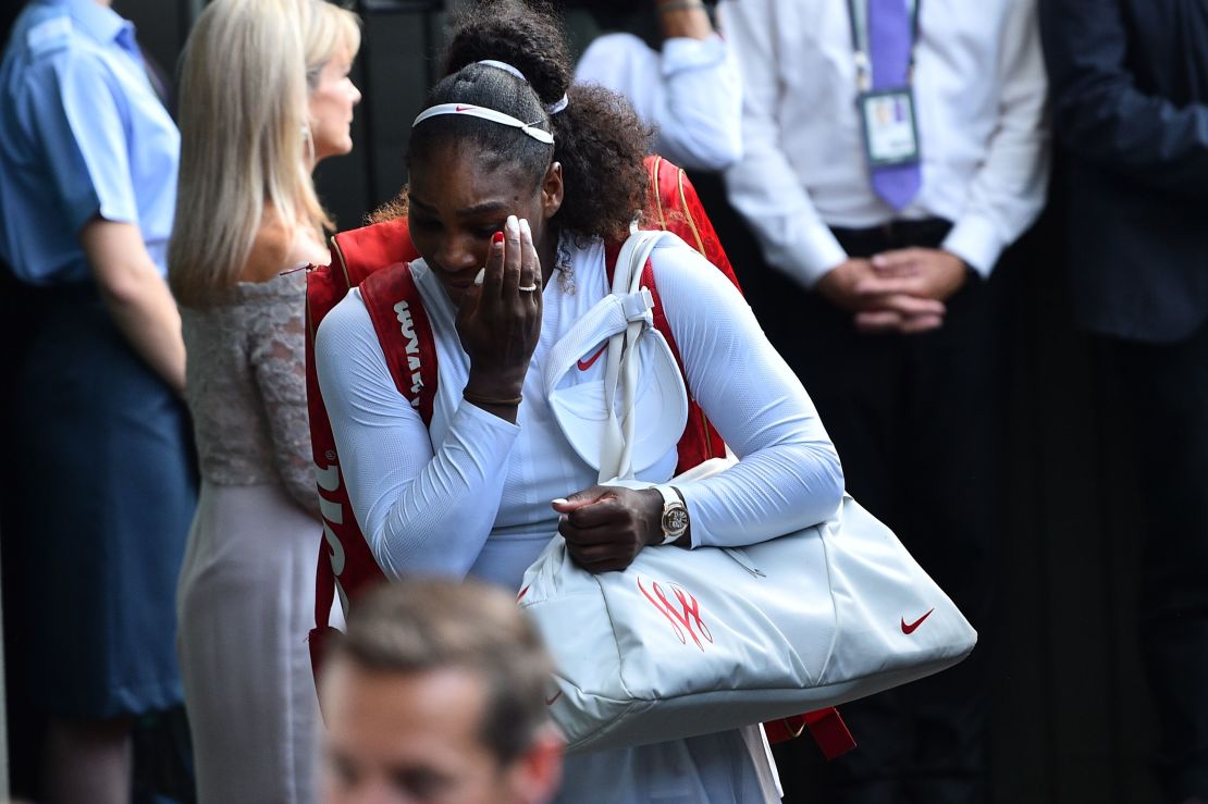 Williams leaves the court after losing to Germany's Kerber